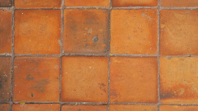 Terracotta tile floor in warm orange tones